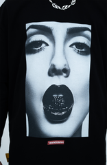 Model in the Haresquare black tshirt with a bold graphic print, styled with Haresquare Shorts in black & Luxury sunglasses – unisex luxury streetwear from Ireland.