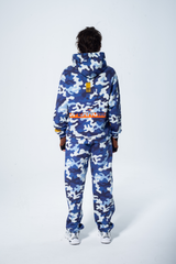 Model in the Haresquare Pink Camouflage Tracksuit with an Orange print – unisex luxury streetwear from Ireland.