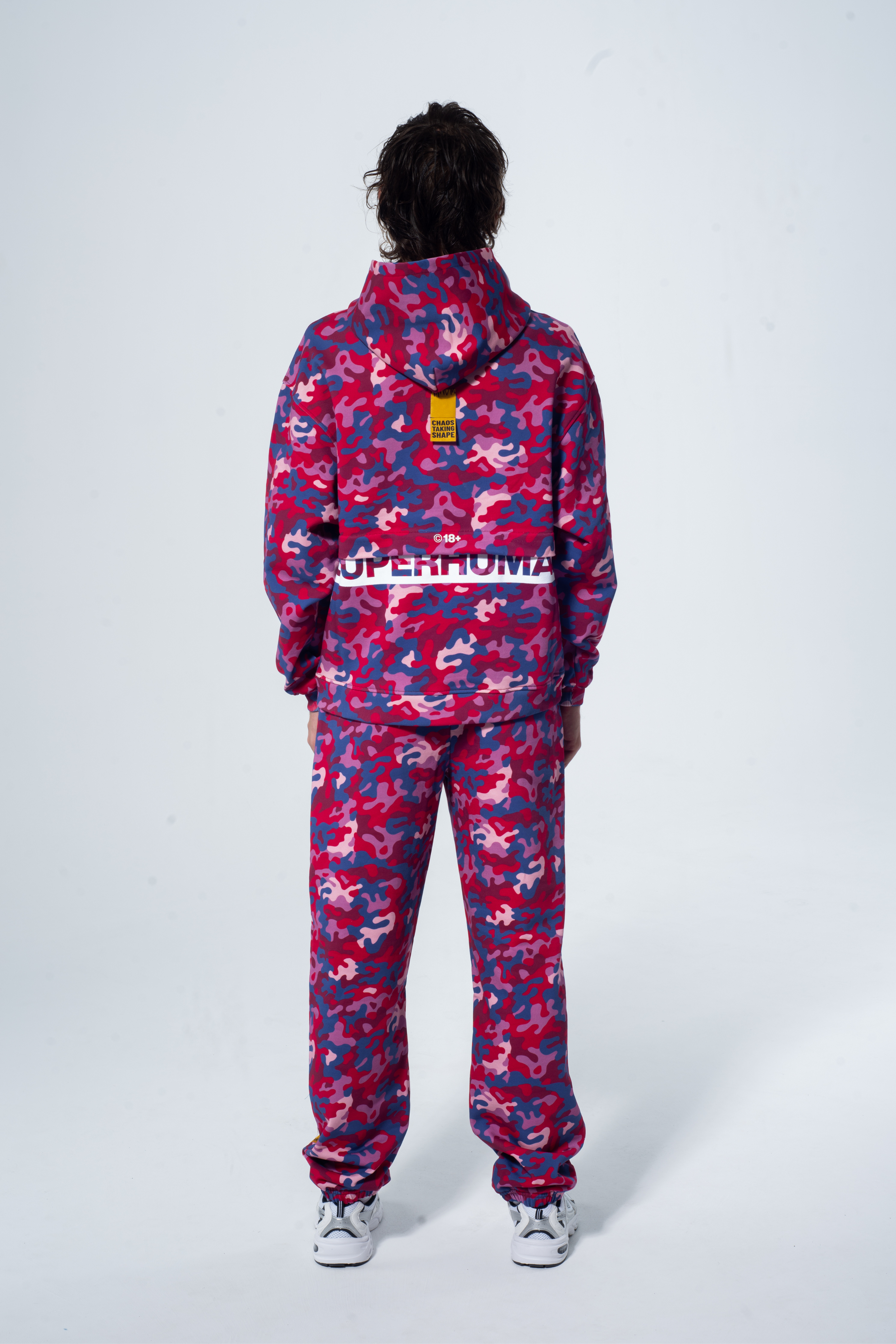 Model in the Haresquare Pink Camouflage Tracksuit – unisex luxury streetwear from Ireland.