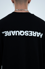Model in the Haresquare Black T-shirt with a white print - unisex luxury sportswear from Ireland